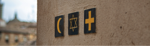 Logo Dialog der Religionen (c) Noah Holm via Unsplash Logo Dialog der Religionen